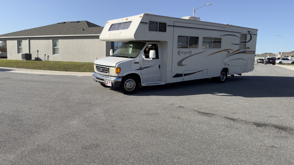 Class C motorhome purchased for cash, front view — serving Florida